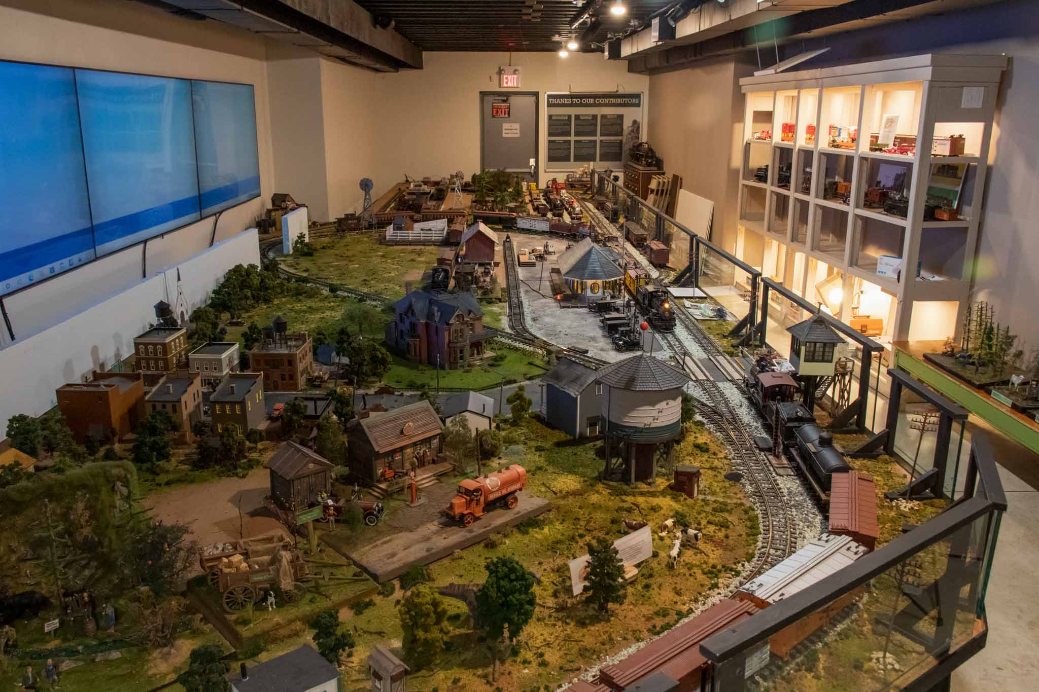 A wide angle photo of the large, 1/24th scale train diorama inside Freeman Station in Burlington.